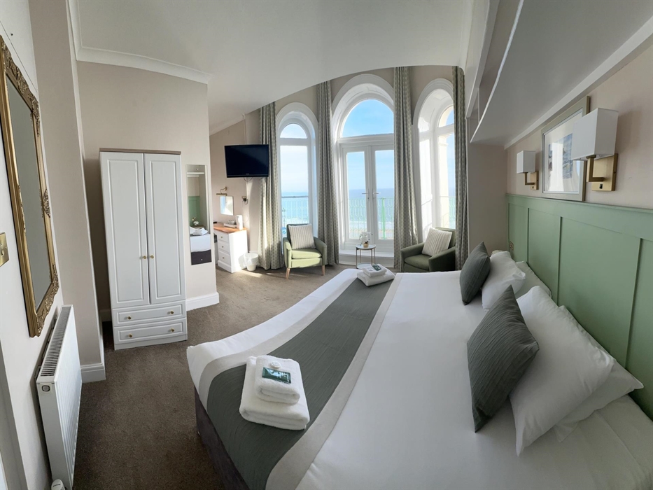 Please Note: Room 104 is the only Premier Room that comes with an accessible balcony for a more inclusive viewing experience. It's recommended to cont