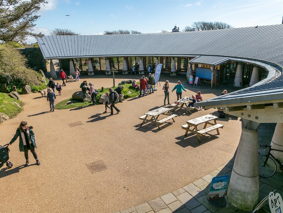 Visitors milling around outside Oriel y Parc National Discovery Centre