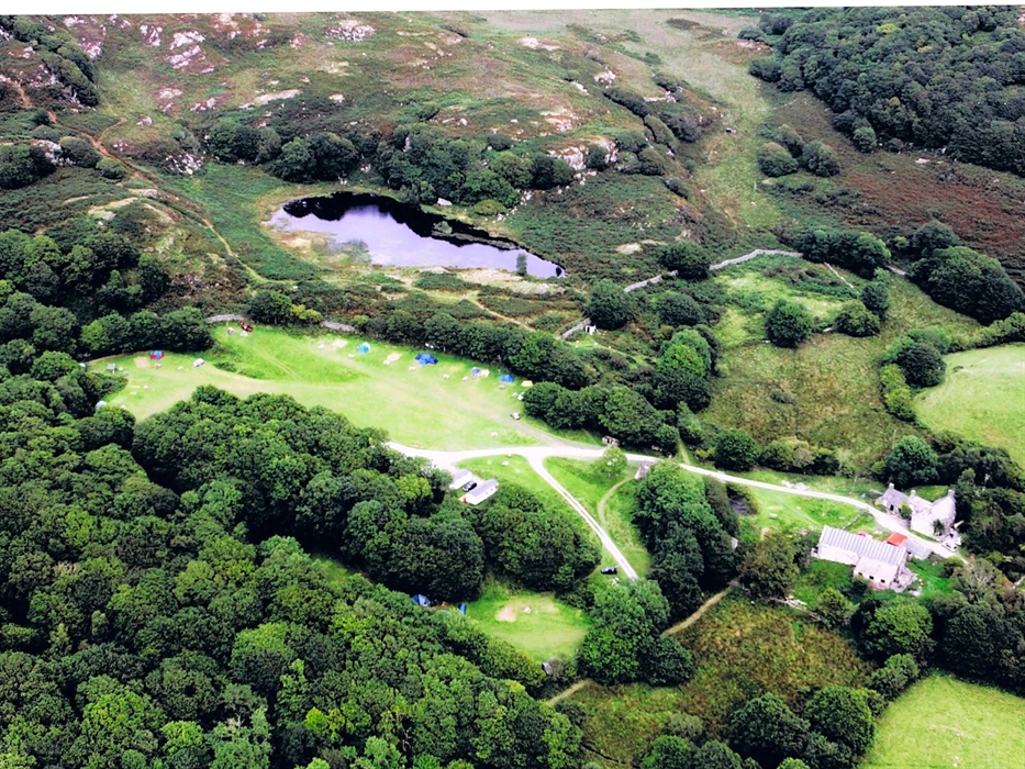aerial view of lake and campsite