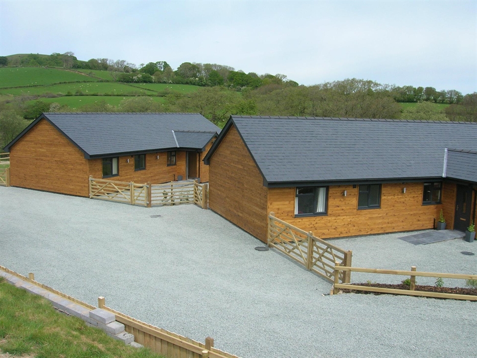 Entrance to both Lodges which are brand new for 2019 and graded 5 star by Visit Wales.  These luxury lodges will sleep up to 6 guests each in 3 bedroo