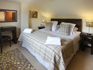 The main bedroom in Heather Cottages