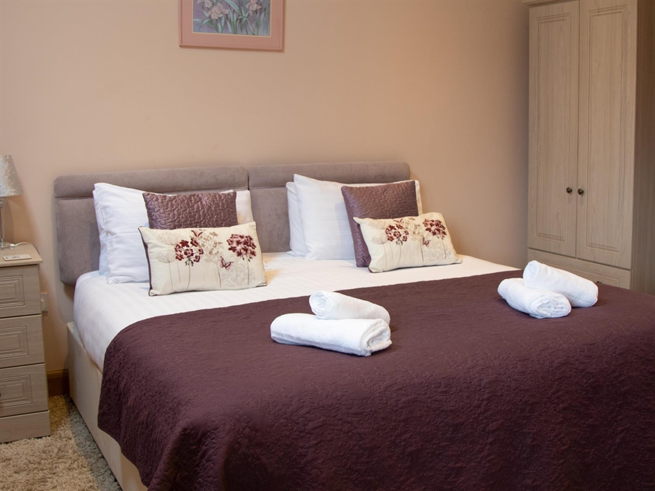 This is the bedroom made up with the super king bed