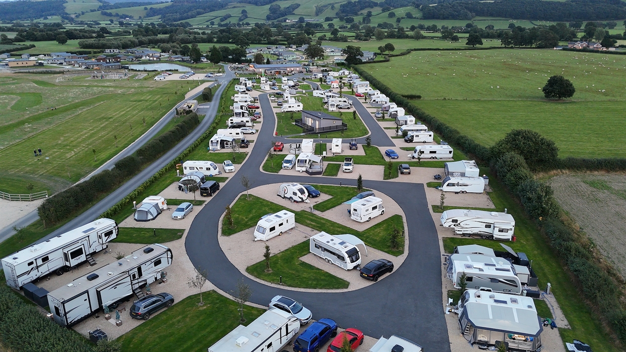A full touring park, full of families enjoying themselves