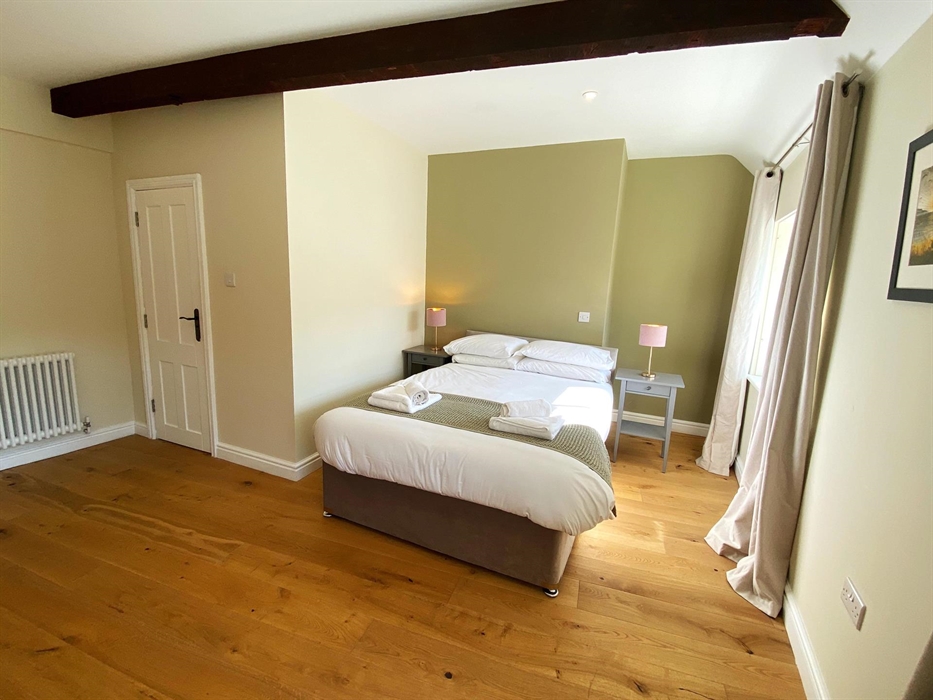 One of our double rooms with a view of the town of Llangollen