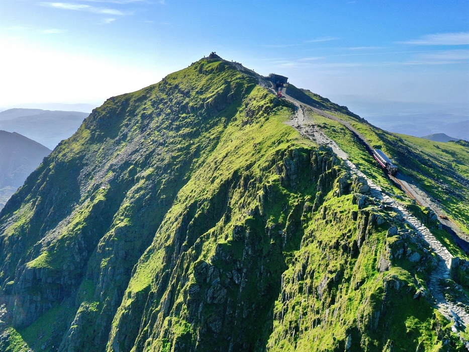 Diesel train on approach to the summit.