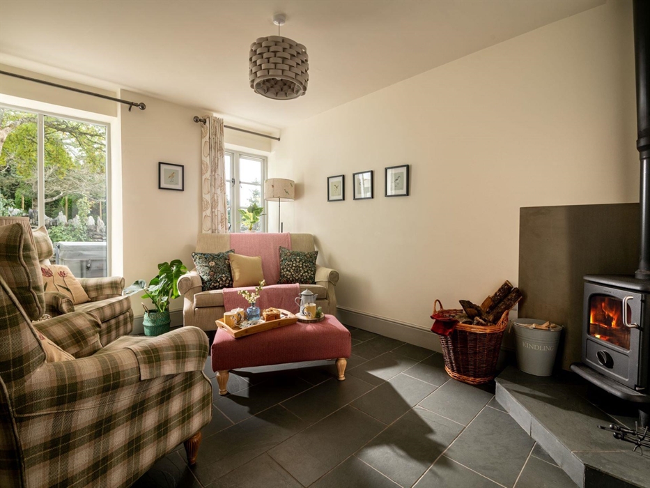 Ever head the phrase cosy cottage? Well, this picture is the definition of that! Roaring fire, underfloor heating and treats to make your stay as home
