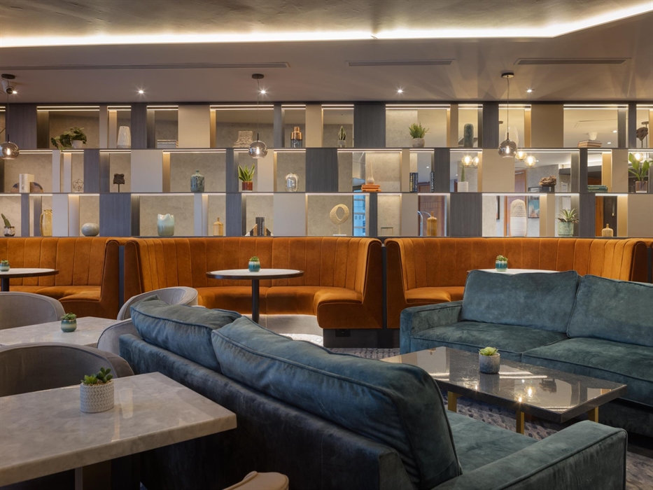 Graze bar is conveniently situated for meeting colleagues over coffee, unwinding with drinks, and enjoying delicious food.