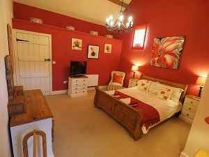 Master bedroom with vaulted ceilings