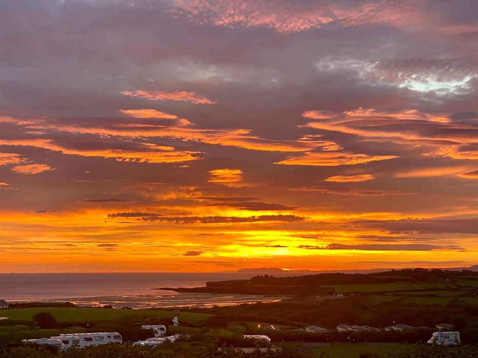 Enjoy glorious sunrise over Lligwy Bay