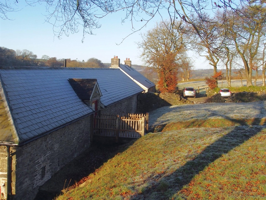 The apartment has its own garden area. there is a sloping ramp down to the main entrance from the parking area