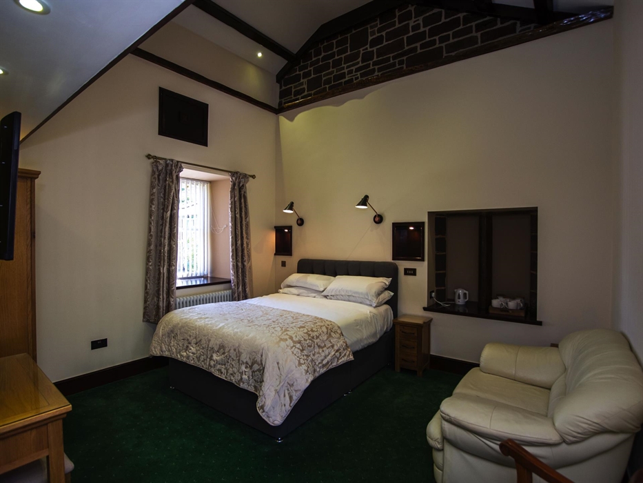 Ground Floor Bedroom. AB13 - Family Room at Craig y Nos Castle.