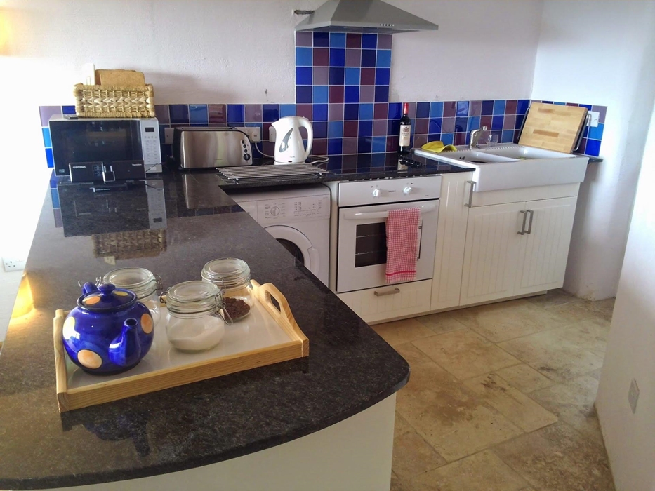 Kitchen with Granite work surface