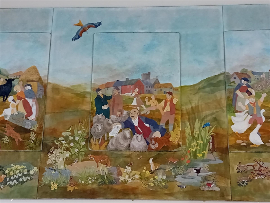 Hanes lleol a chyfoeth bioamrywiaeth yr ardal wedi eu cyfleu ar ffurf tapestri brodiog. Knowledge of the local history of the area and its rich bio-di