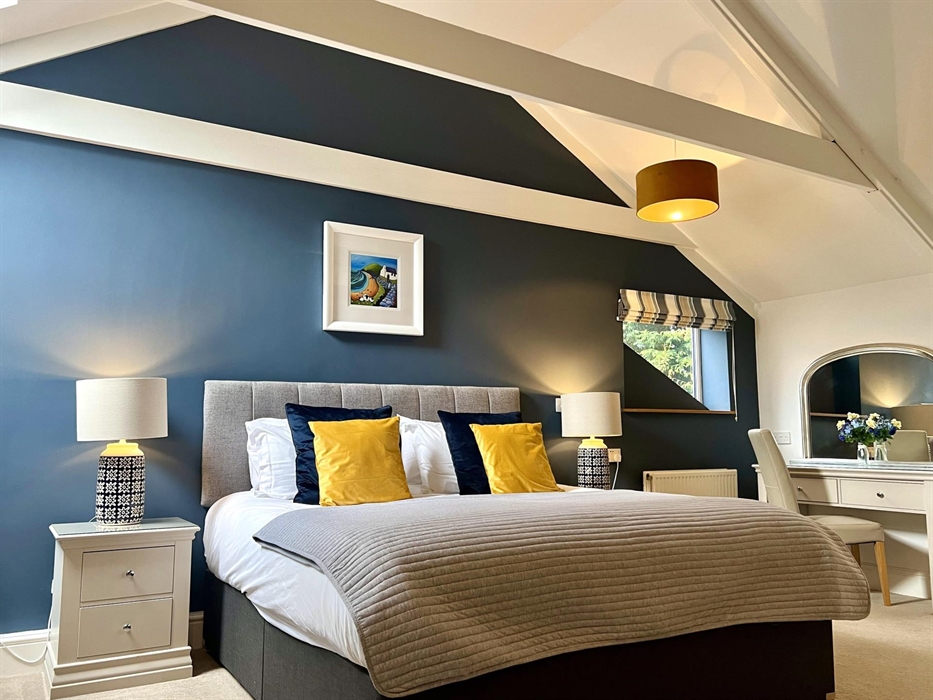 Ty Isaf master bedroom with superking bed.