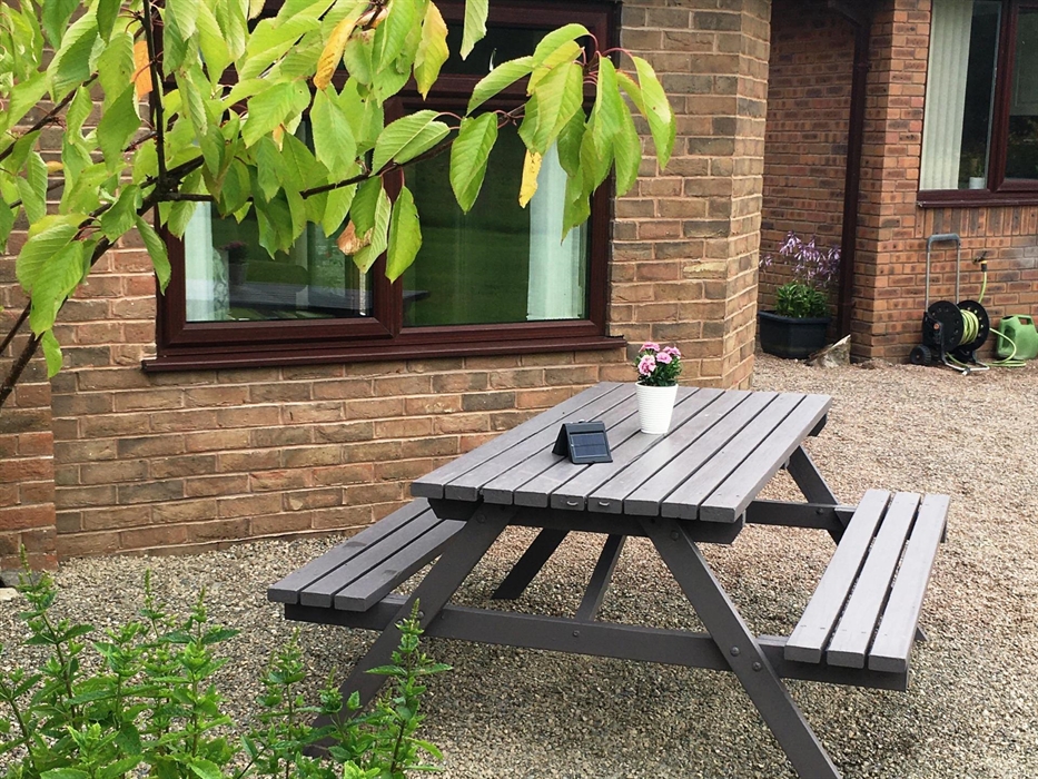 Relax and enjoy the peaceful location overlooking the fields