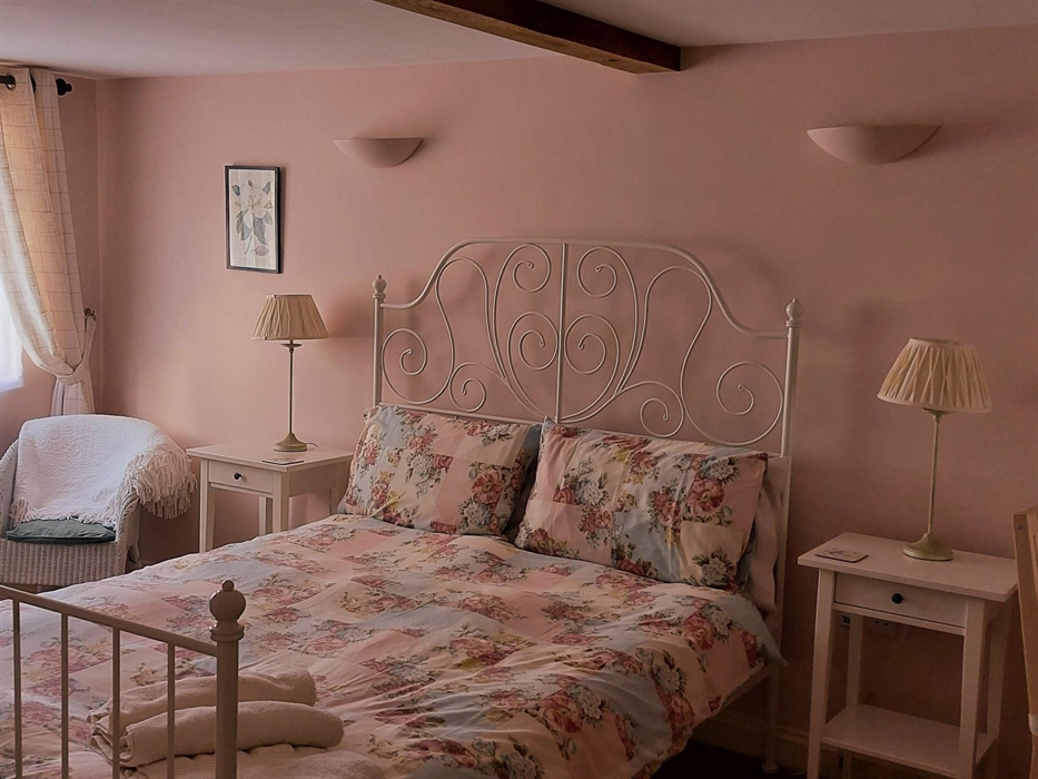 Ground floor bedroom with a walk in shower makes it suitable for less mobile guests. Also a bath, shaver point, magnifying mirror, wardrobe and shelve