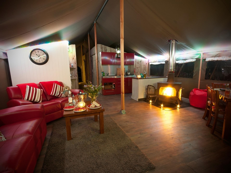 The interior is spacious and comfortably caters for up to 8 people.  Woodburner and well equipped kitchen should you wish to cook!