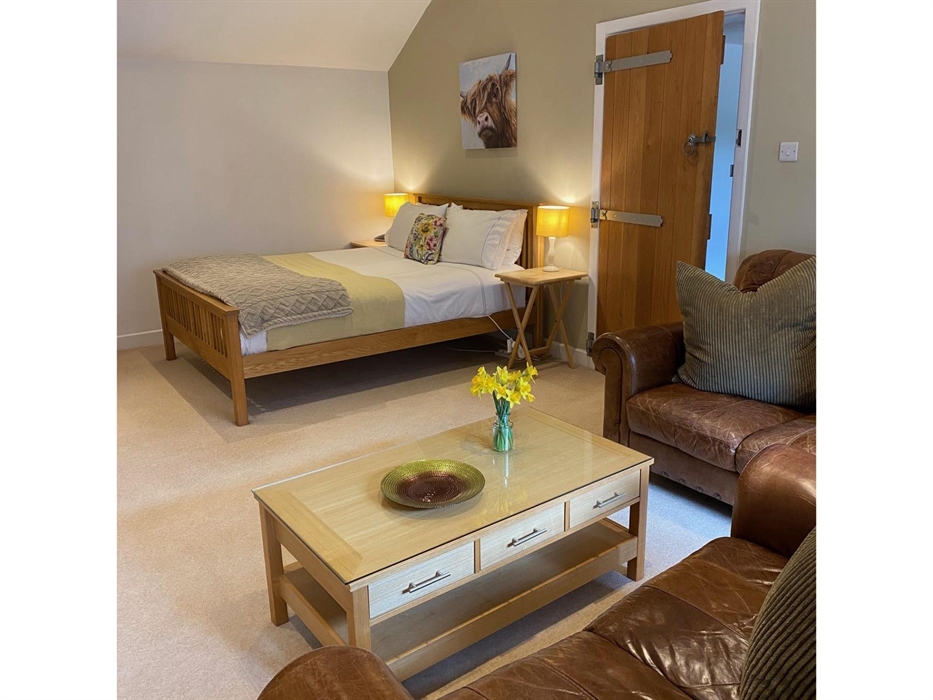 King size bed with 100% cotton bedding