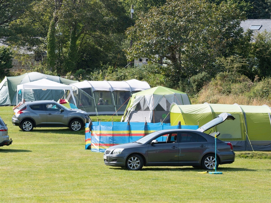 Camping field with a row of camping tents