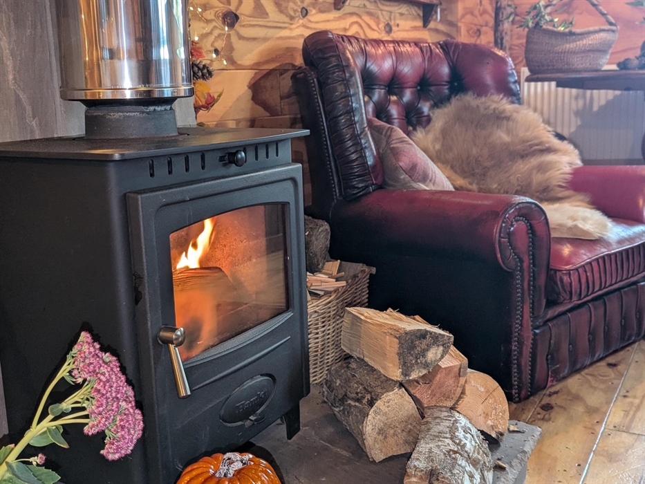 Warm your feet as the chill of the Welsh air is outside. Enjoy building your own fire inside the cabin. The cabin also has central heating if you don'
