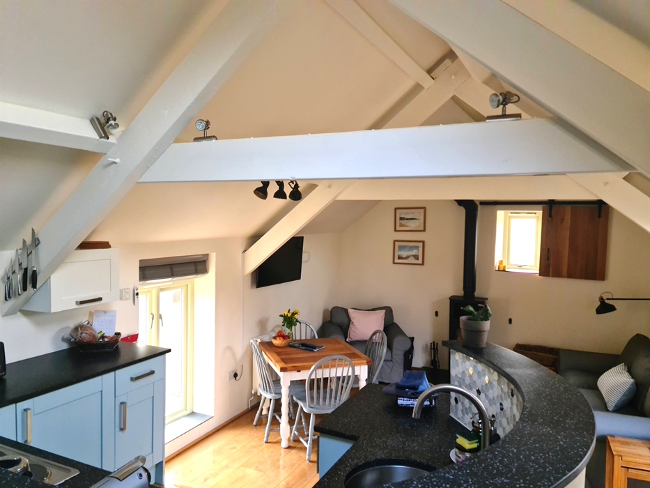 The Living Area of the Mill House: Kitchen, dining and seating areas.