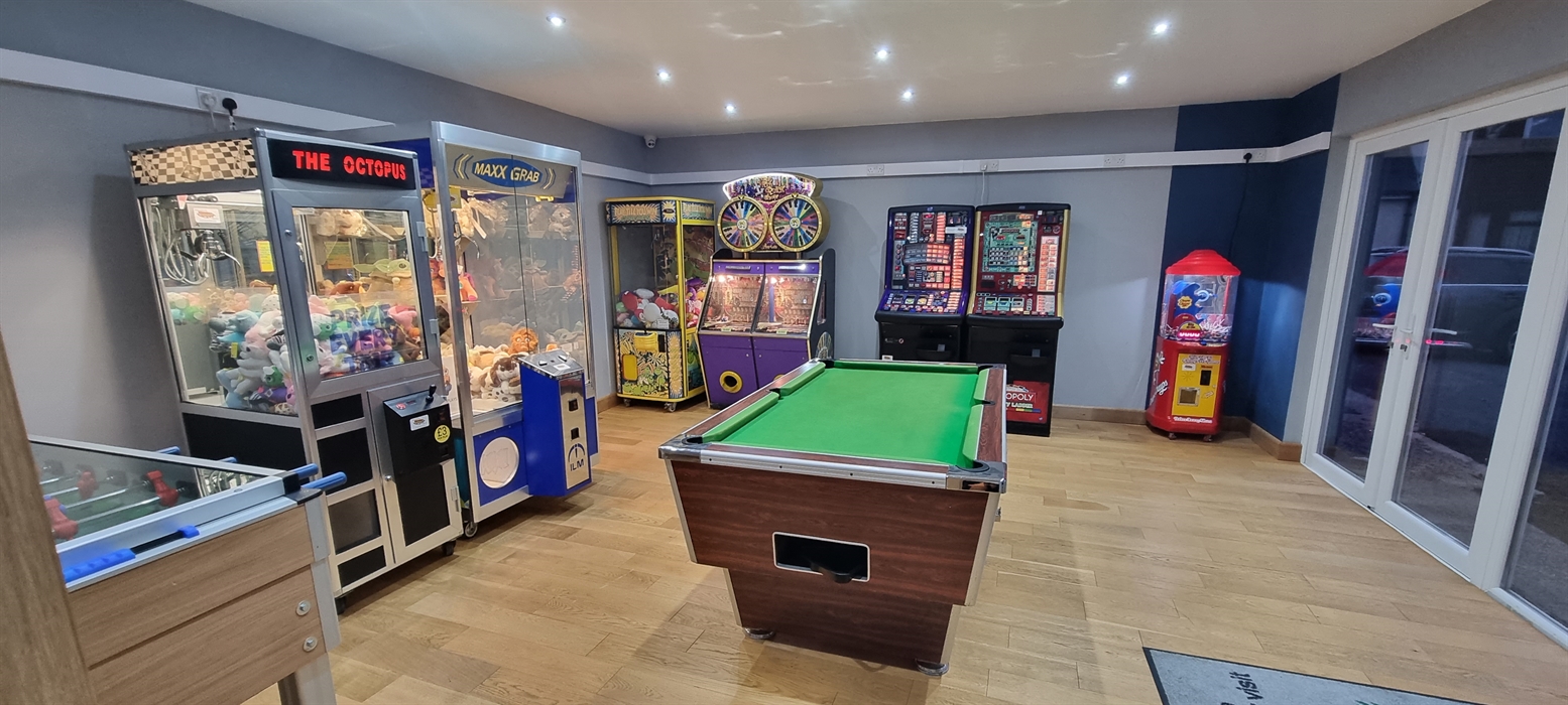 The Redford Cwtch Lounge – a cosy, welcoming space with soft seating, warm lighting, and rustic charm, perfect for relaxing with family or friends aft