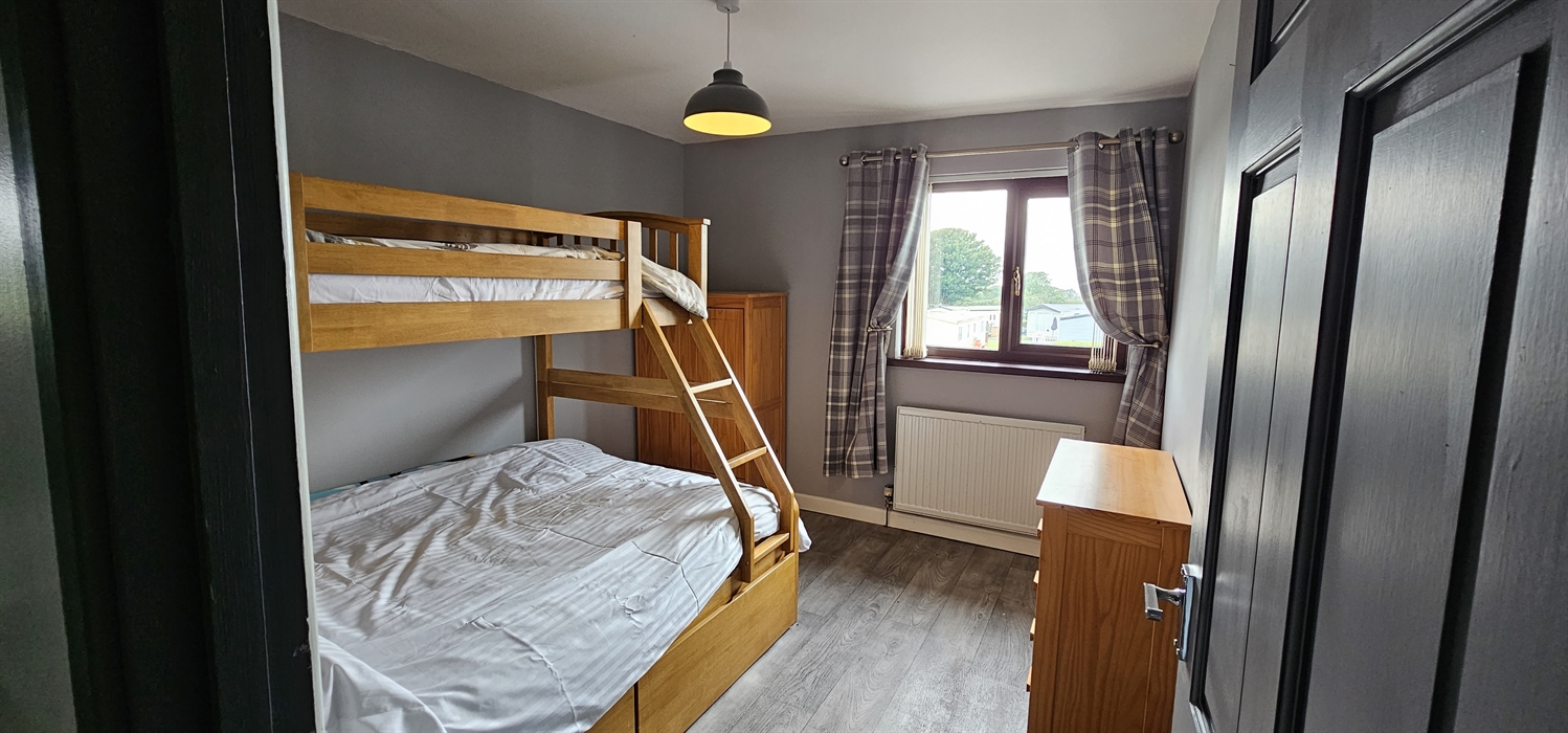 The Redford Cwtch Lounge – a cosy, welcoming space with soft seating, warm lighting, and rustic charm, perfect for relaxing with family or friends aft