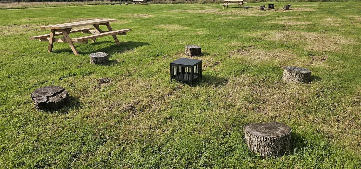 The Redford Cwtch Lounge – a cosy, welcoming space with soft seating, warm lighting, and rustic charm, perfect for relaxing with family or friends aft