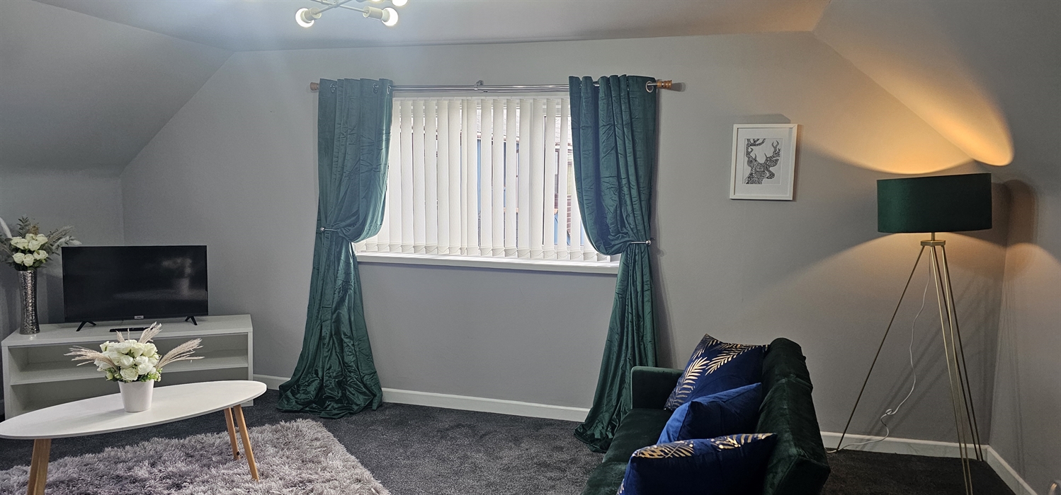 The Redford Cwtch Lounge – a cosy, welcoming space with soft seating, warm lighting, and rustic charm, perfect for relaxing with family or friends aft