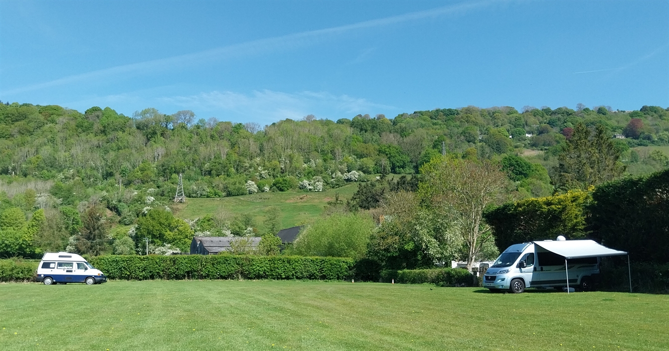 Camping field at Pyscodlyn with Llanwenarth Breast in the background