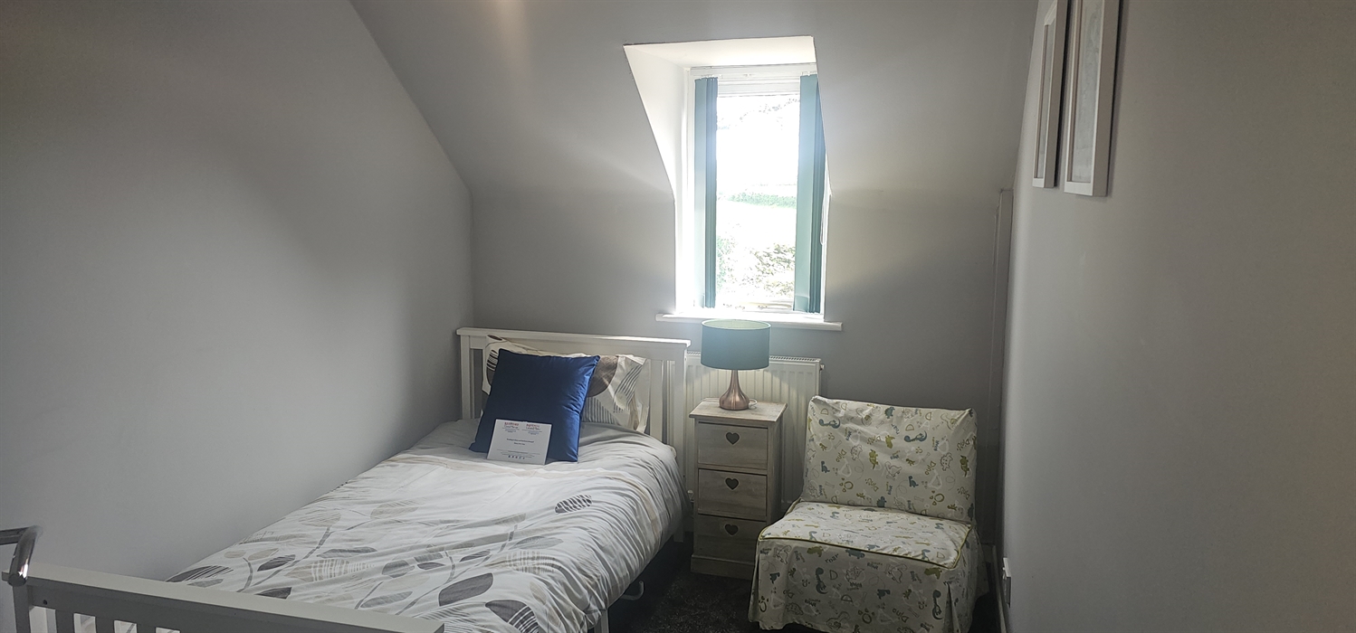 The Redford Cwtch Lounge – a cosy, welcoming space with soft seating, warm lighting, and rustic charm, perfect for relaxing with family or friends aft