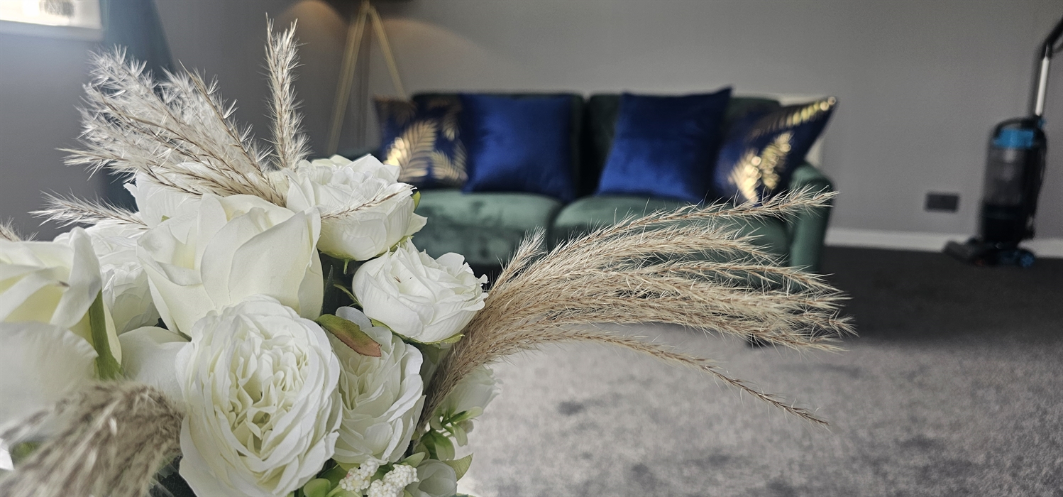 The Redford Cwtch Lounge – a cosy, welcoming space with soft seating, warm lighting, and rustic charm, perfect for relaxing with family or friends aft