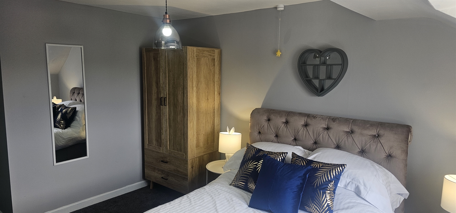 The Redford Cwtch Lounge – a cosy, welcoming space with soft seating, warm lighting, and rustic charm, perfect for relaxing with family or friends aft