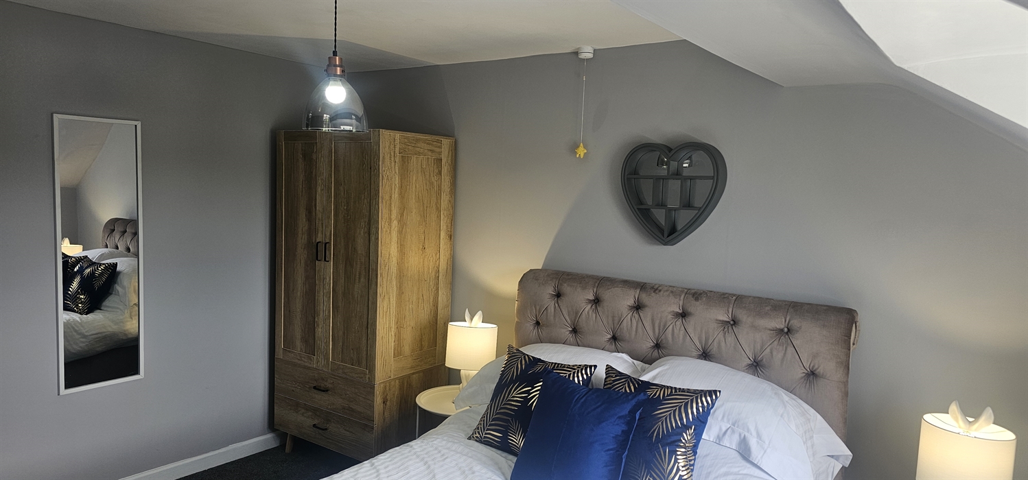 The Redford Cwtch Lounge – a cosy, welcoming space with soft seating, warm lighting, and rustic charm, perfect for relaxing with family or friends aft
