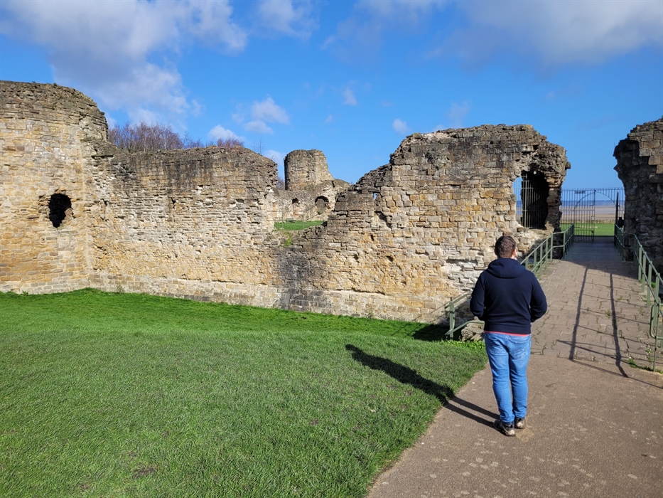 A person inside a castle wall