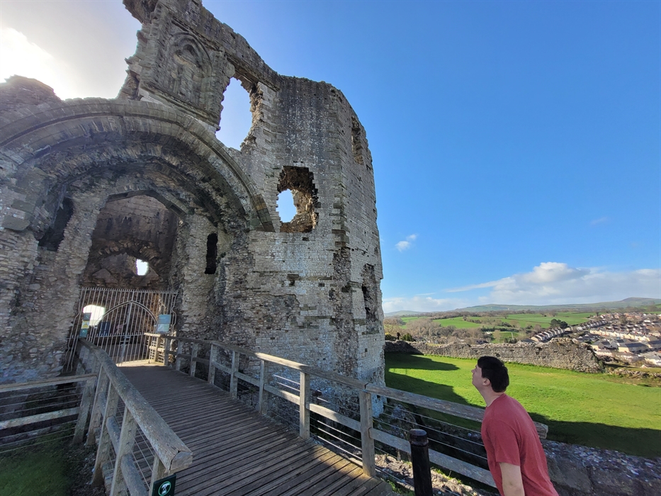 Person approaching a castle entrance