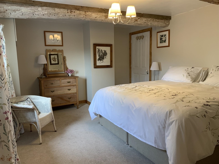 Woolly theme with British wool carpet, bed and mattress