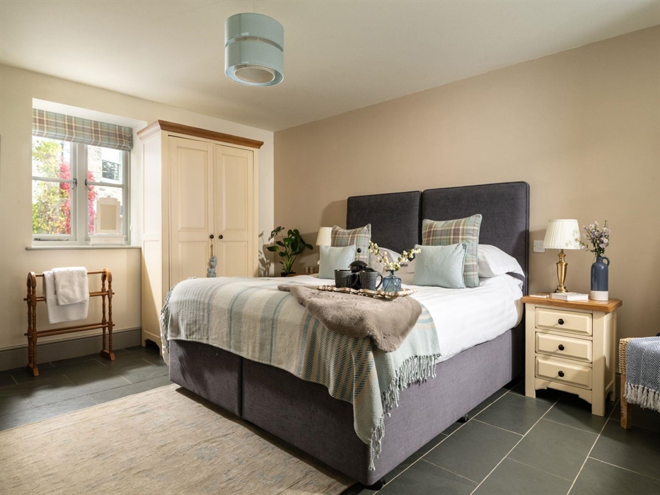 This spacious bedroom is 1 of 4 and is able to switch into a twin room to accommodate your party's sleeping arrangements.