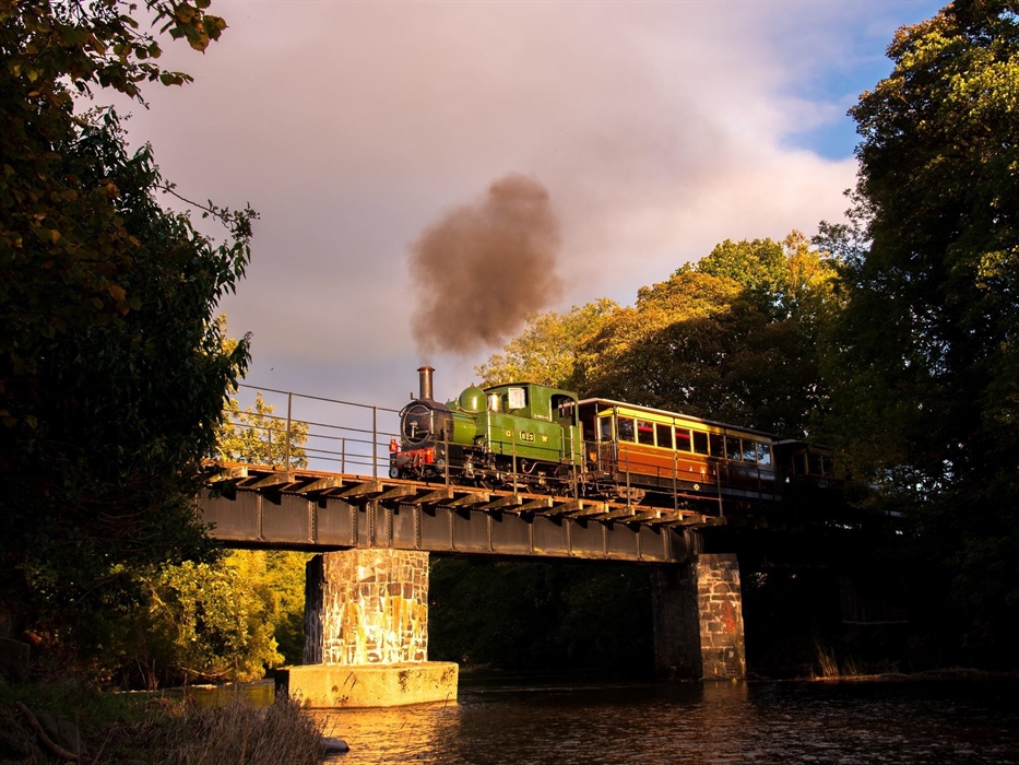 Steaming across Banwy Bridge on a summer's evening in Mid Wales