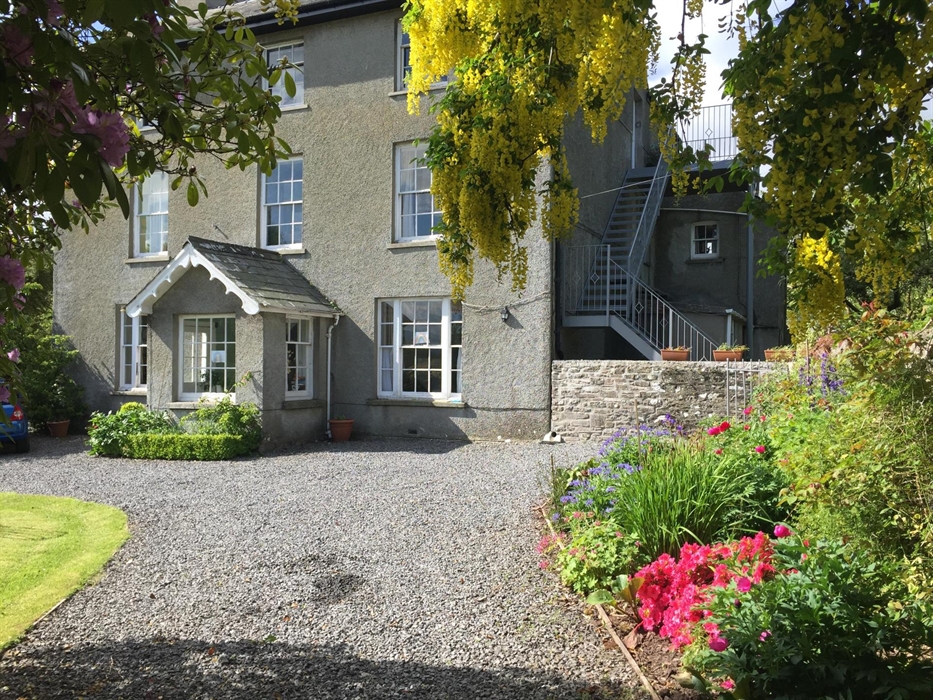 The Main House showing the staircase