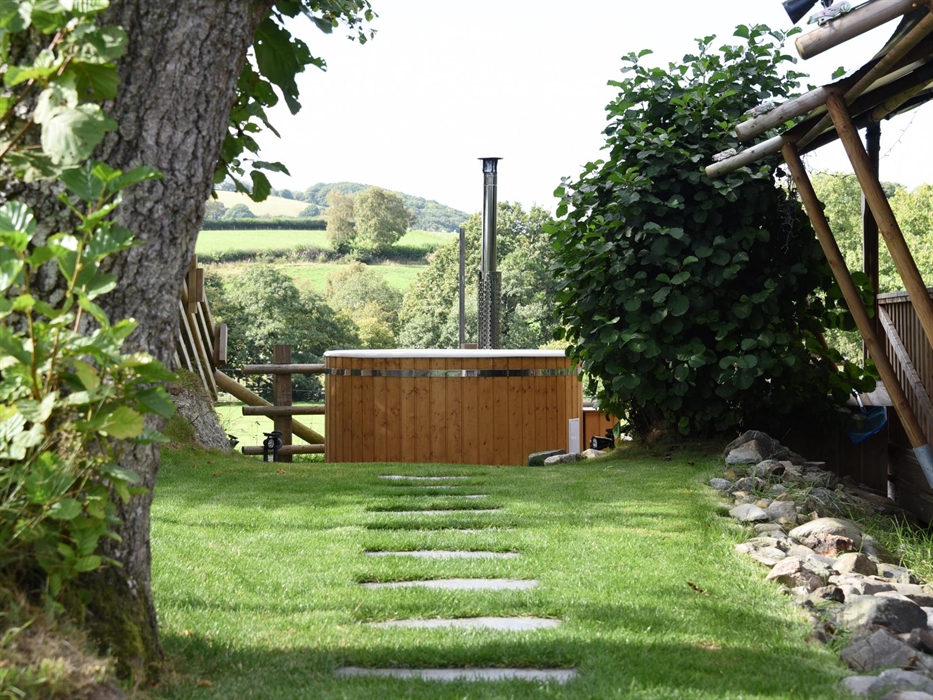 Enjoy your hot tub with a view across the countryside