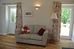 The sitting area looks out onto the courtyard.