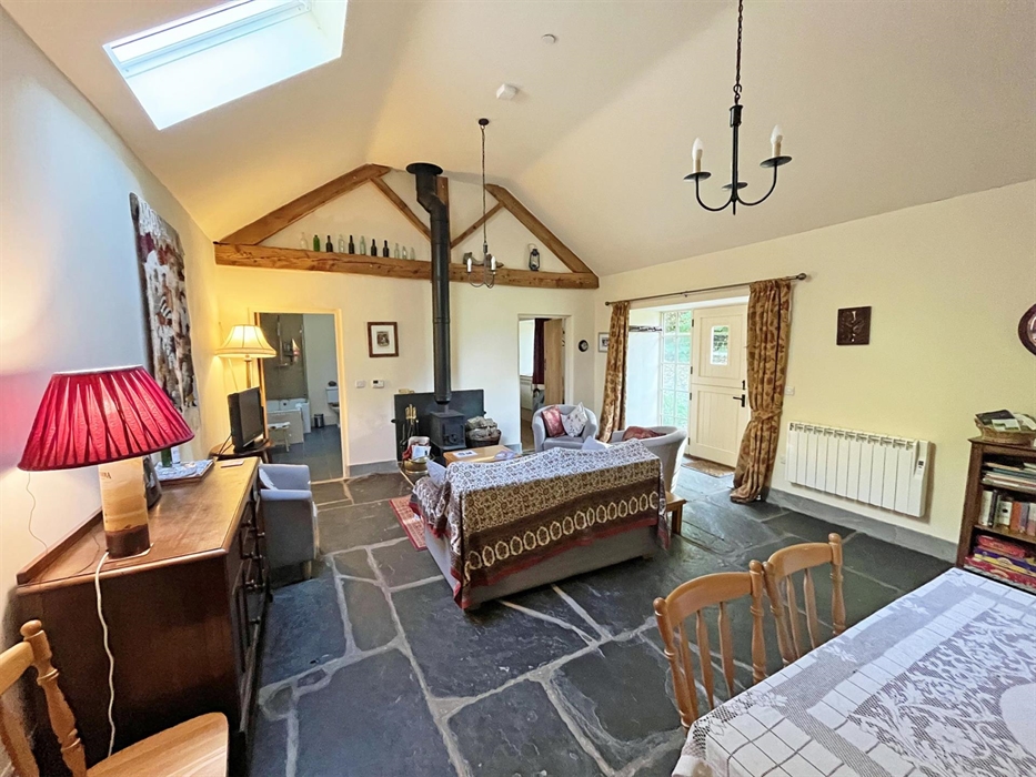 Drovers retreat living room from the double bedroom towards bathroom, twin bedroom and front door