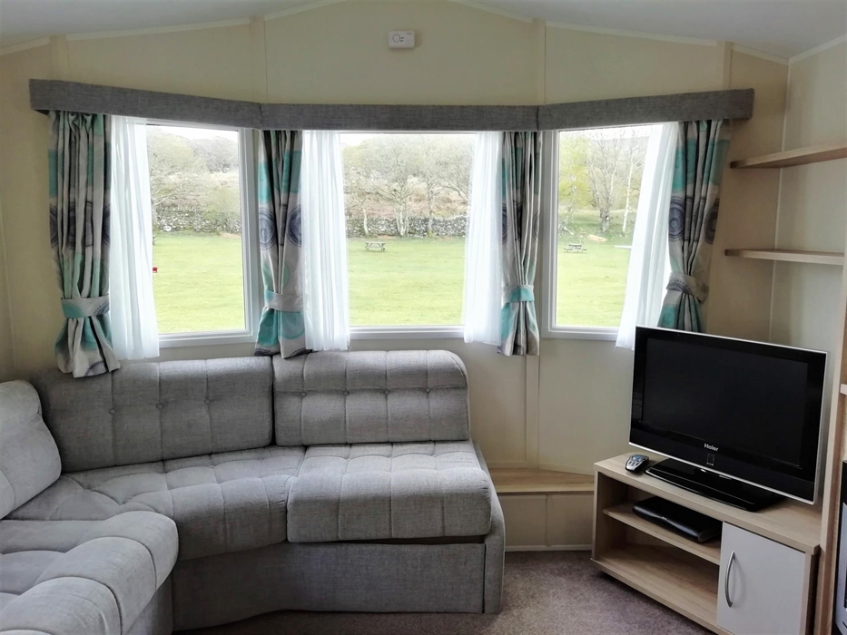 Interior caravan with view of field