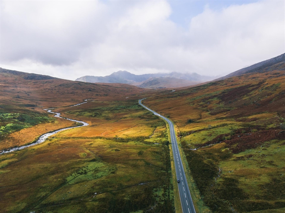 Beautiful lone road through Snowdonia National Park in North Wales