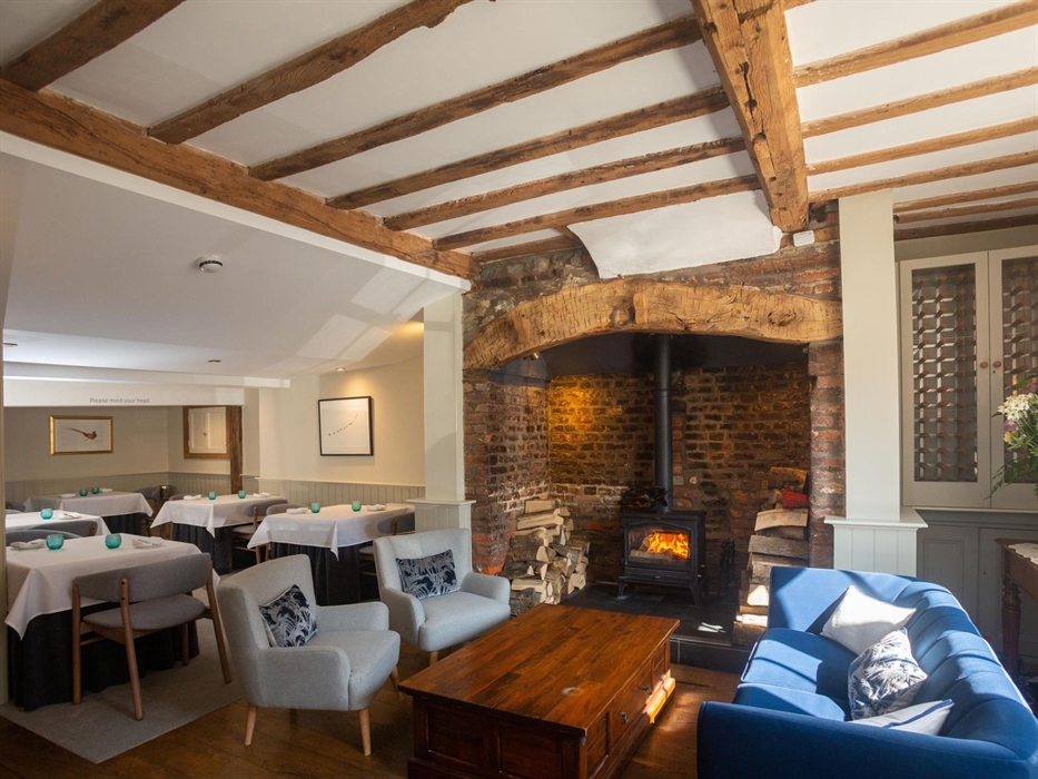 Inside the restaurant by the fireplace