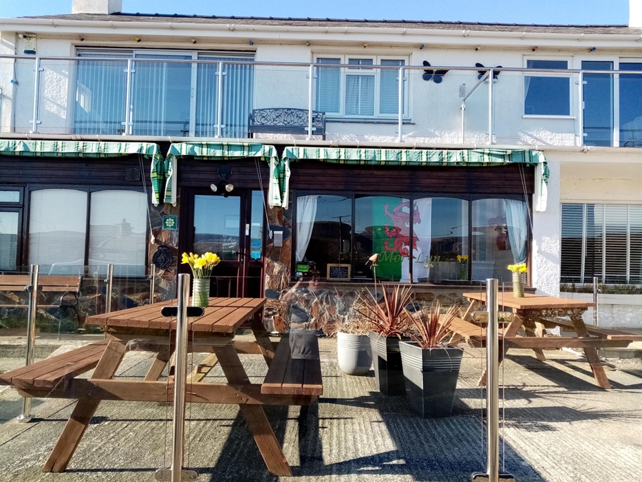 Upstairs rooms have private balconies, and the downstairs have their own private patio spaces