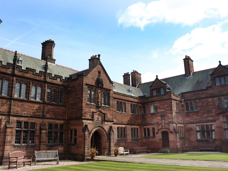 The exterior of Gladstone's Library, a neo Gothic Victorian building.