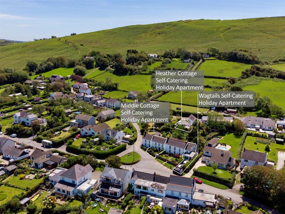 Three self-catering cottages with gardens walk to Britannia Inn or local beaches