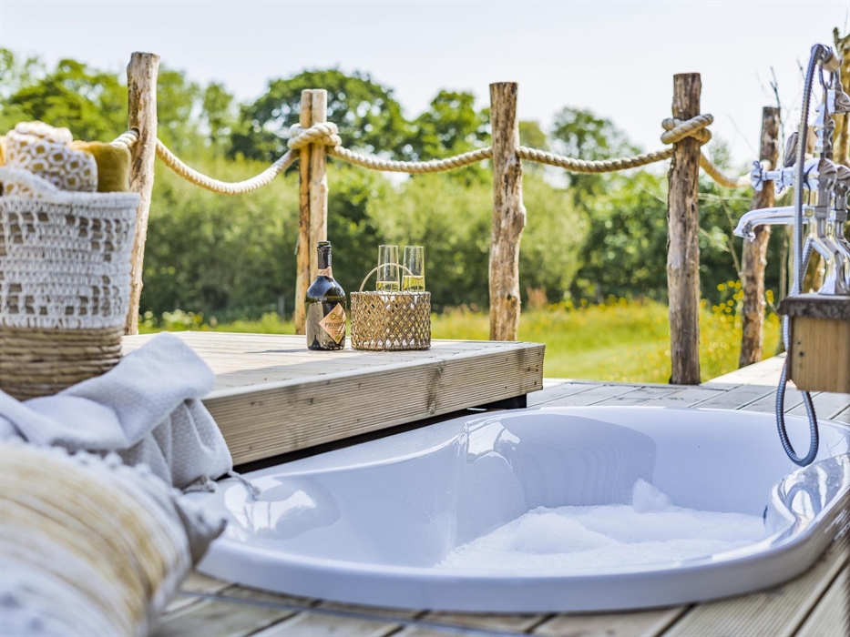 Relax in style in the Cabins outdoor sunken bath - Luxury Glamping Cabin Carmarthenshire, West Wales
